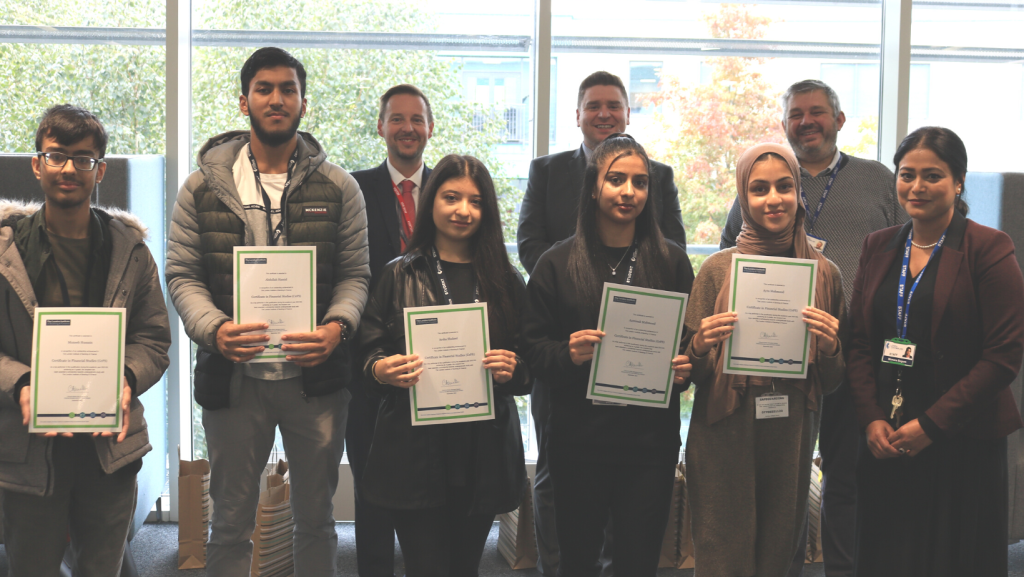 Celebratory picture of students with their Financial Studies Awards along with members of staff and the awarding visitor. This is being used for decorative purposes.